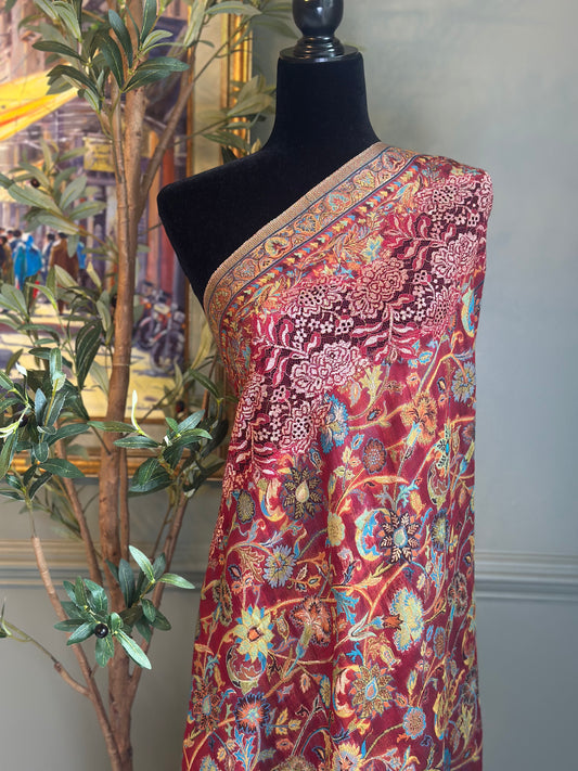 Wrap with floral pattern on a mannequin against a neutral background